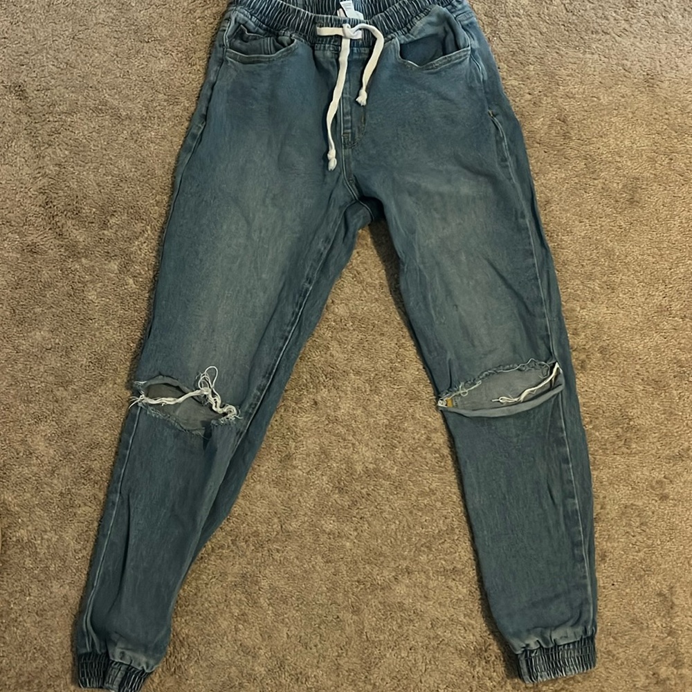 Women’s blue jeans joggers with rips, size small